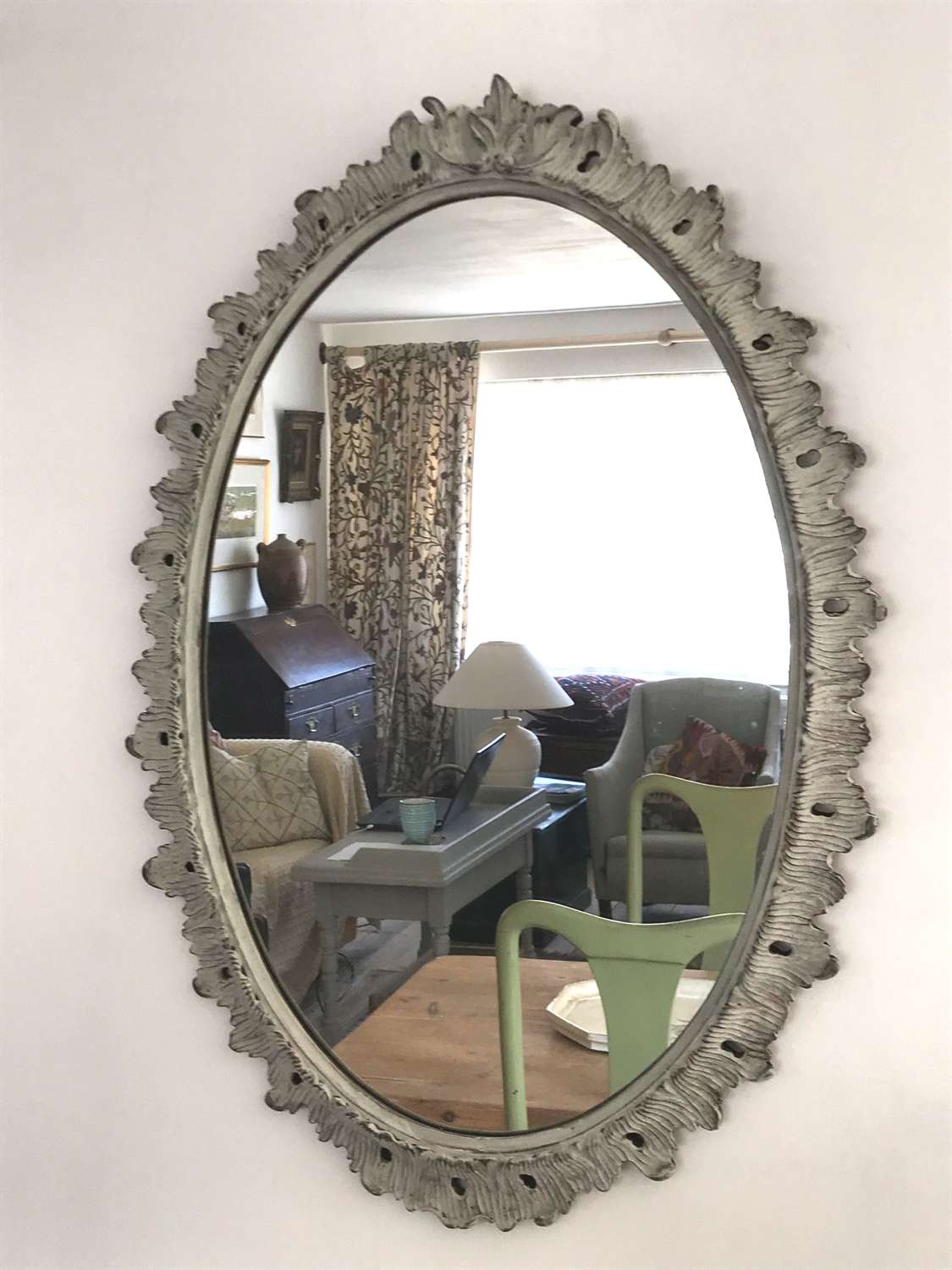 Decorative Mirror in carved oval frame