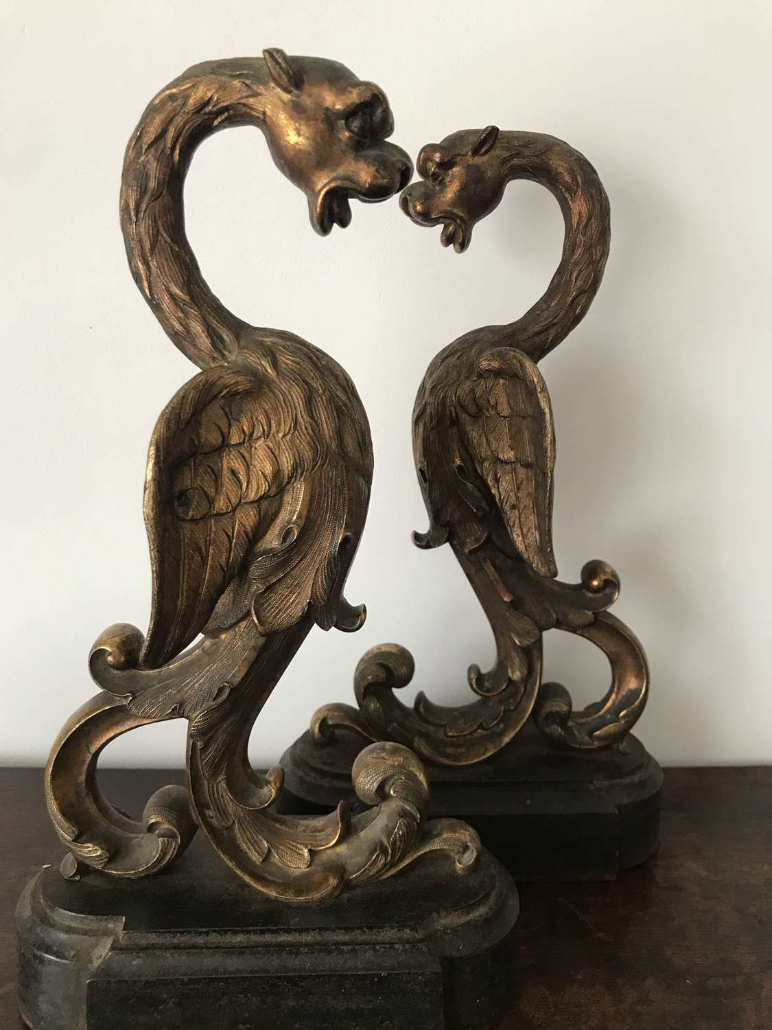 19th century Cast and Gilded pair of Gryphons