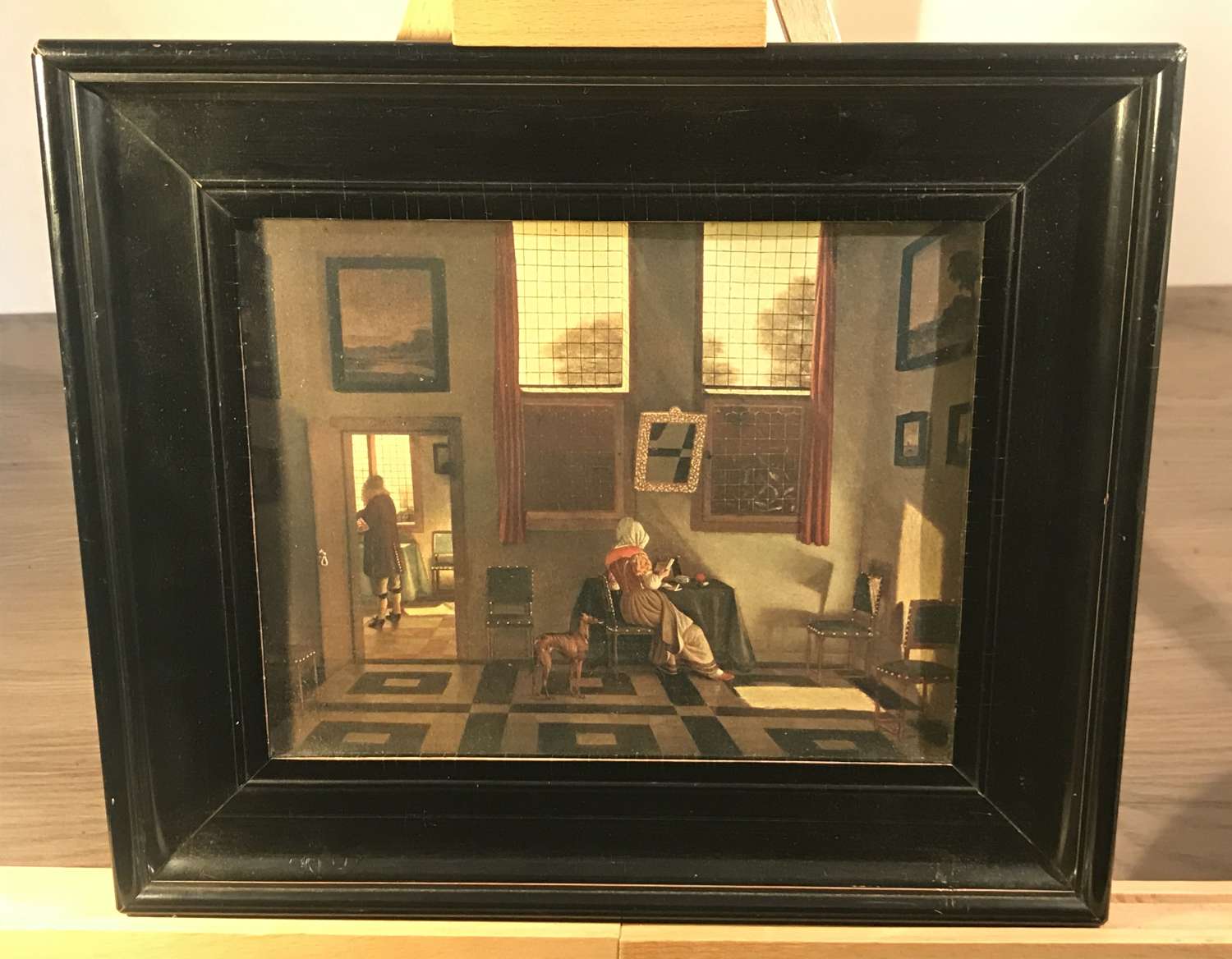 Vermeer print in a 19th century ebonised frame