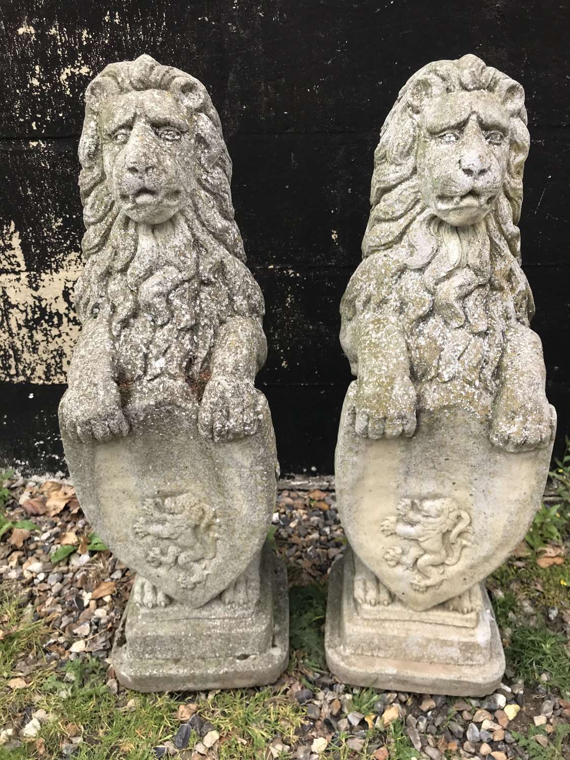 Pair of garden or gate post Lions with shields