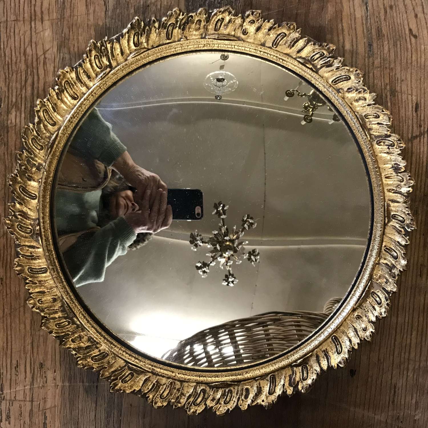 Vintage convex mirror in decorative gilt frame