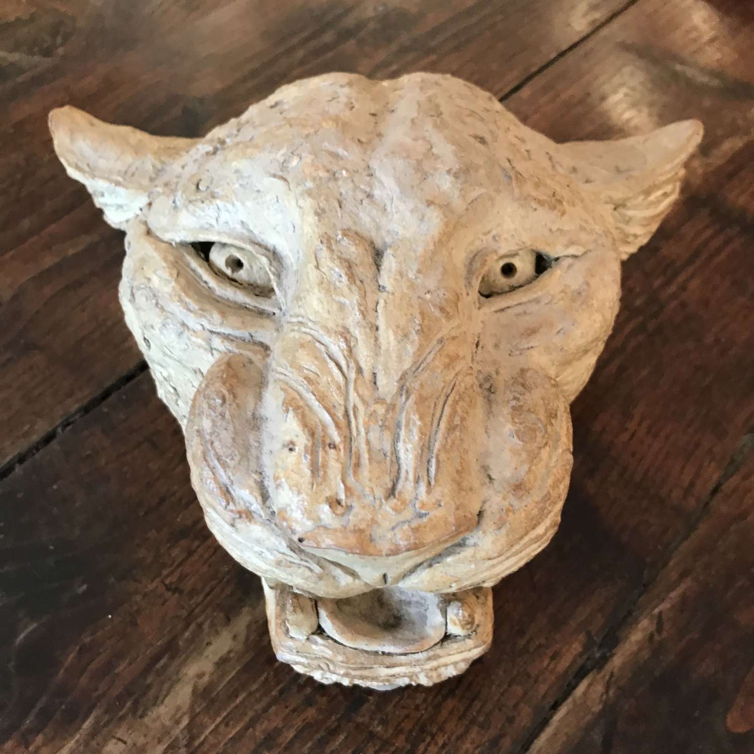 Studio ceramic head of a big cat