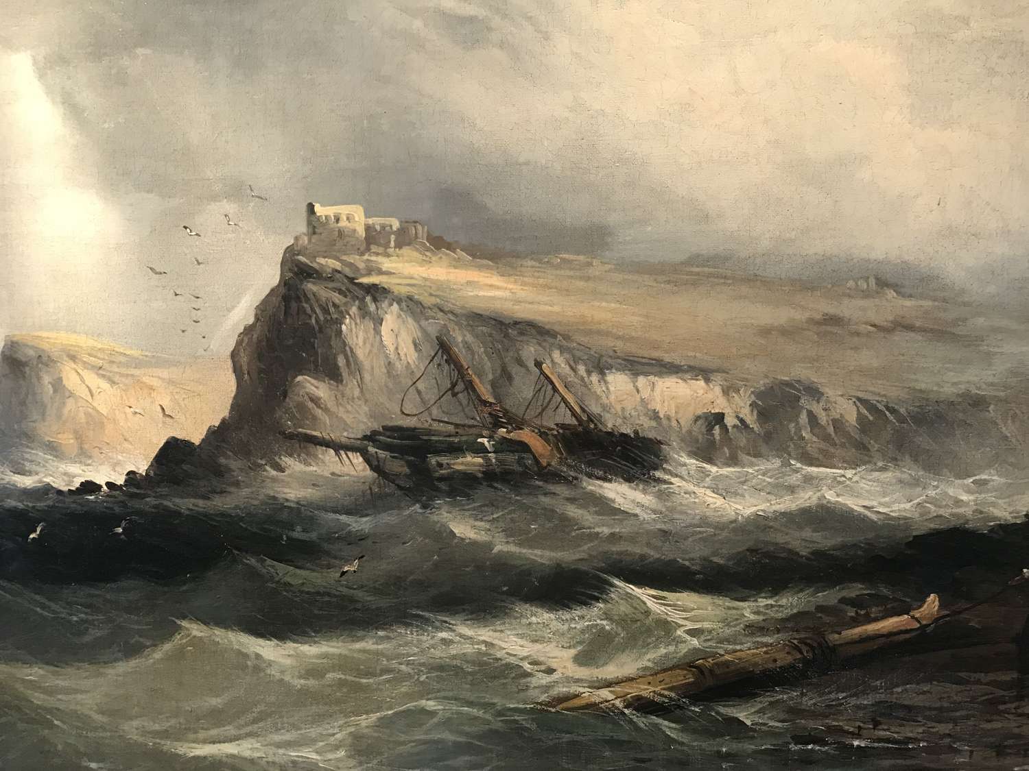 19th Marine oil painting of a wreck in the manner of JWM Turner