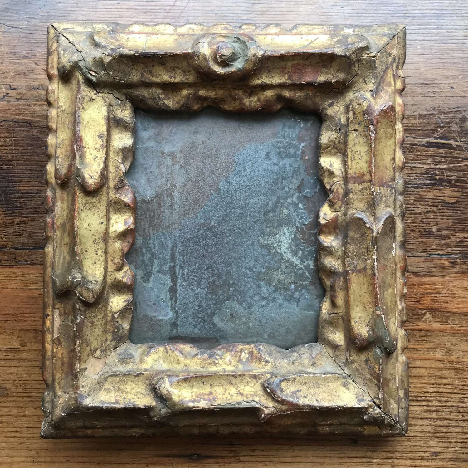 18th century Florentine carved & gilded mirror.