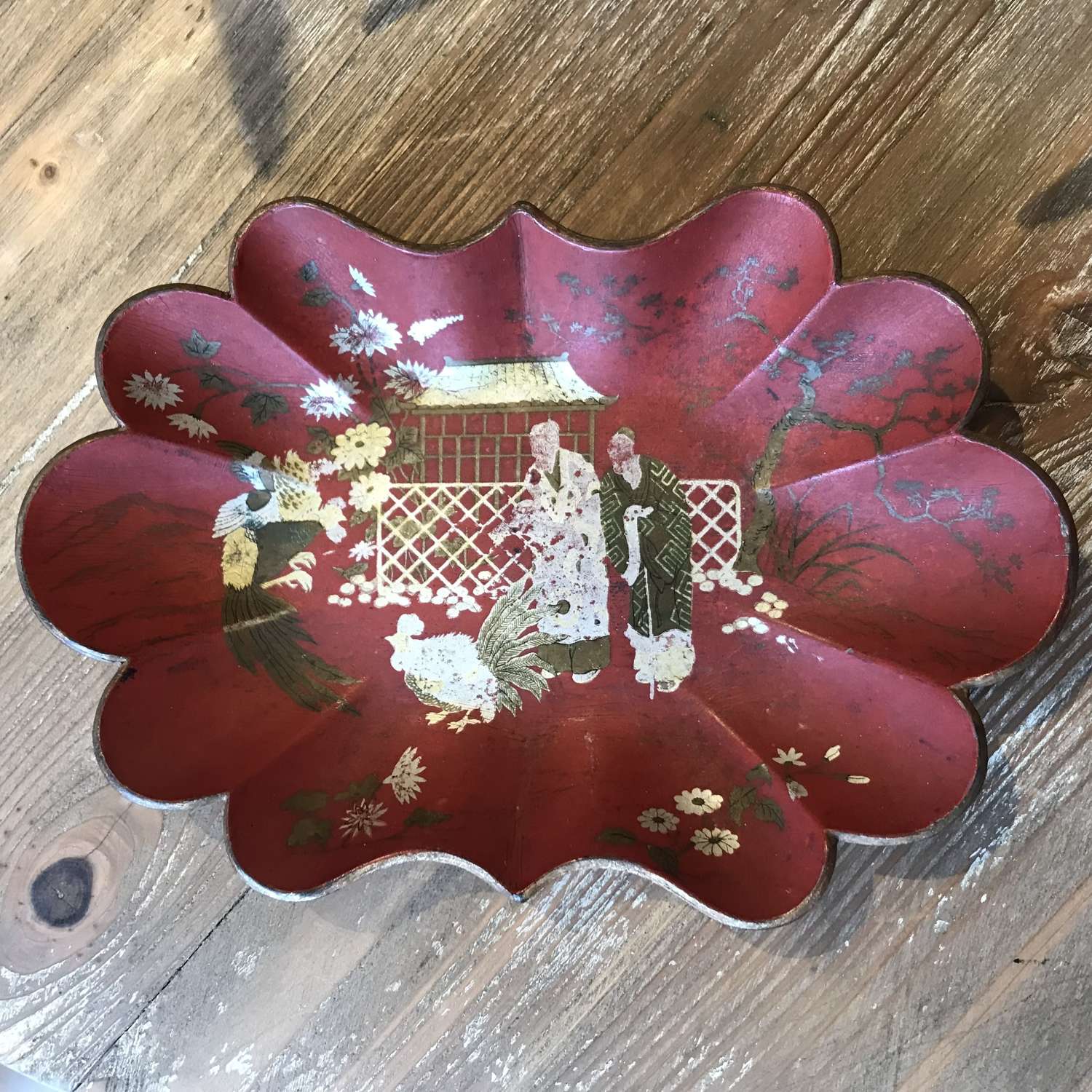 Red chinoiserie papier-mâché dish with silver and gilt decoration